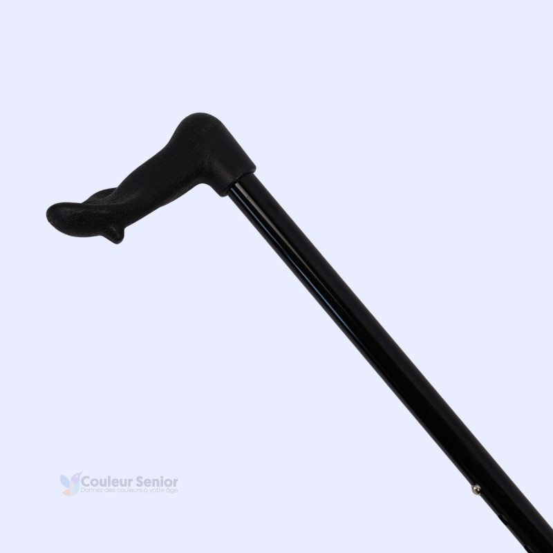 Diagonale mi-hauteur vers le haut de la canne de marche noire réglable, détail du tube et de la poignée.
