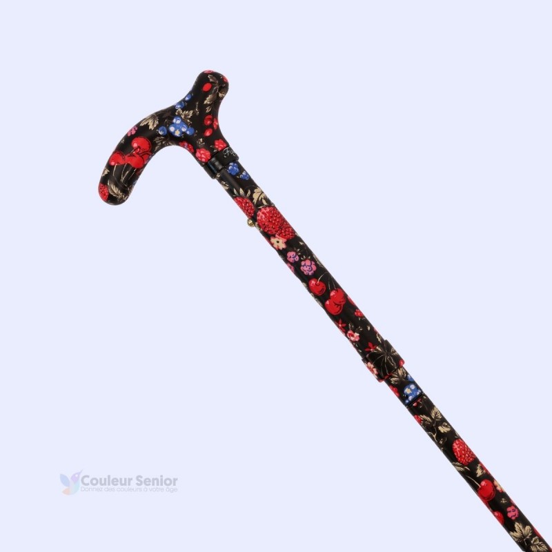 Vue diagonale de la canne de marche pour femme, fruits rouges vibrants et poignée T.