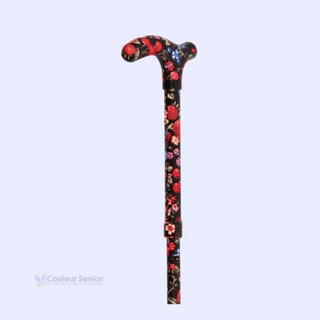 Vue à 45 degrés de l'ergonomique poignée T noire de cette canne de marche pour femme.