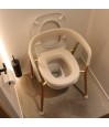 Chaise de toilette Let's Help Me avec accoudoirs sûrs et réglables en hauteur, au design très élégant.