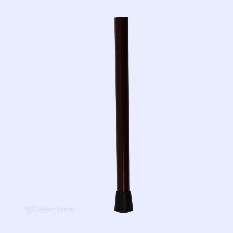 Détail de l'embout sécurisé sur cette canne bicolore, en matériau naturel et biodégradable.