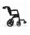 Rollz Motion noir mat en mode fauteuil de transfert, vue de côté avec grandes roues pneus pleins et repose-pieds déployés