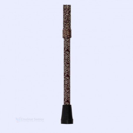 Détail de l'embout de cette canne de marche à motif de petites fleurs marron pour femme. Base discrète en aluminium élégant.