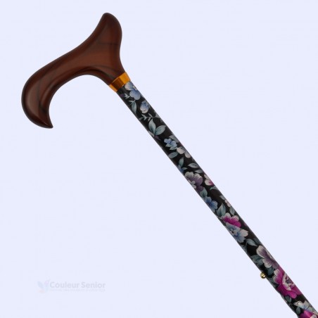 Détail féminin: canne de marche de luxe fleuri en aluminium pour femme, poignée Derby en bois élégante.
