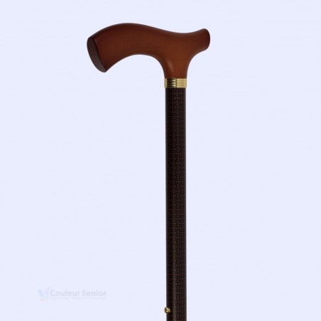Belle poignée en bois sur une canne de marche marron, discrète, pour les seniors. Éligible au remboursement par la Sécu.