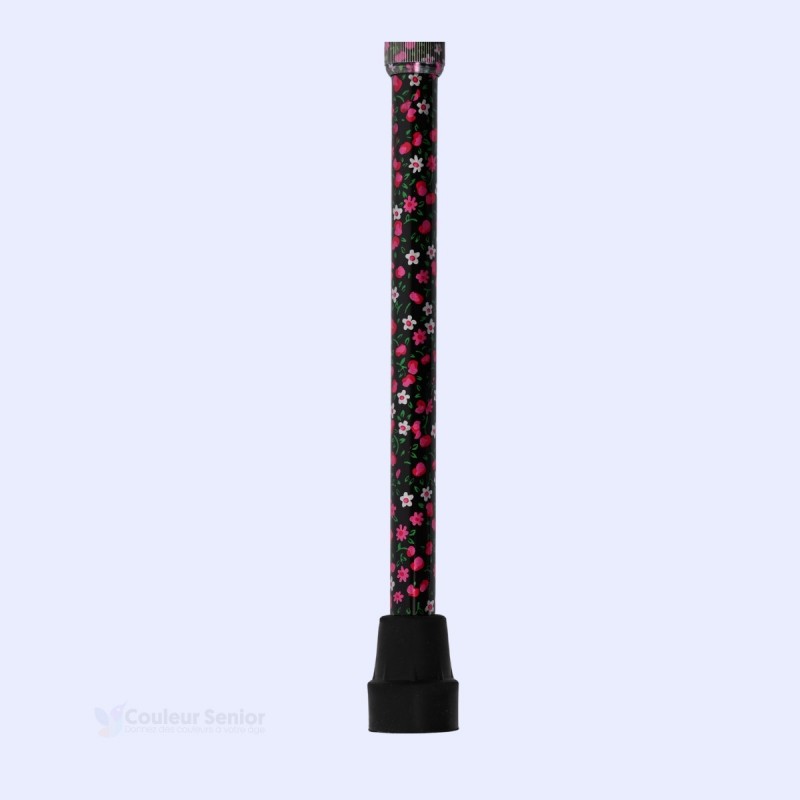 Embout sécurisant pour cette canne de marche pour femme aux fleurs roses sur fond noir. Idéal au quotidien.