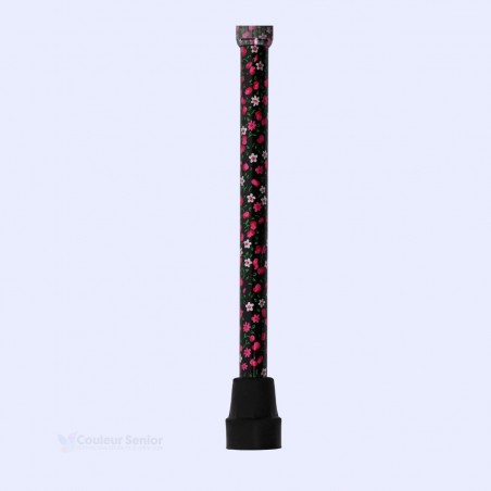 Embout sécurisant pour cette canne de marche pour femme aux fleurs roses sur fond noir. Idéal au quotidien.