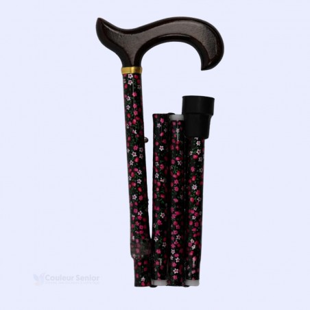 Canne de marche florale pliée à droite, avec réglage de hauteur.  Produit éligible au remboursement par la Sécu