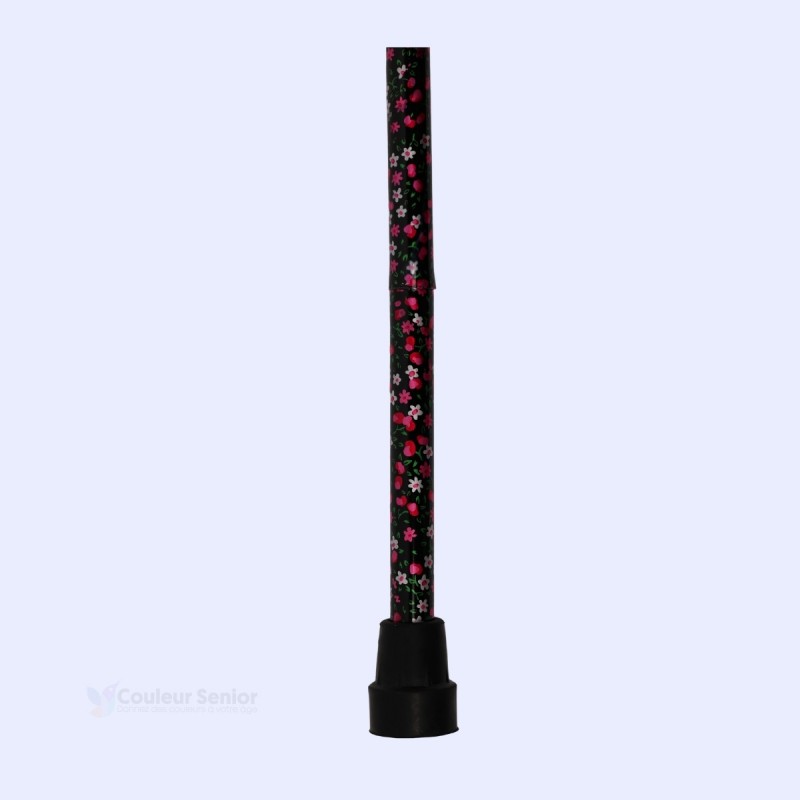 Embout sécurisé de la canne de marche florale noire, indispensable pour la stabilité des seniors.
