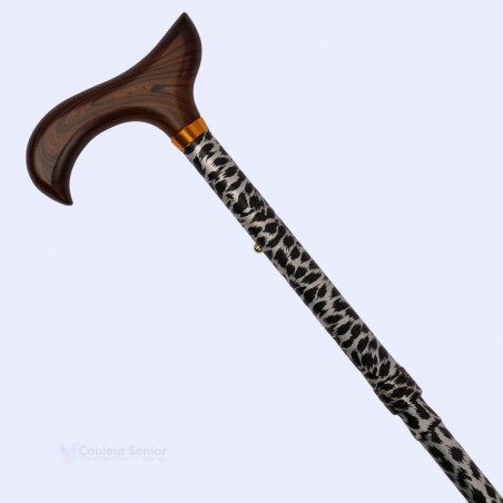 Superbe poignée Derby diagonale pour cette canne de marche motif léopard originale, parfaite pour une femme.