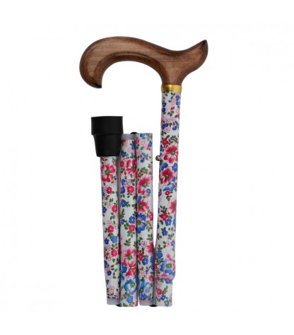 Canne de marche pliable, motif floral sur fond blanc, et poignée en bois clair. Éligible au remboursement par la Sécu.