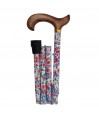 Canne de marche pliable, motif floral sur fond blanc, et poignée en bois clair. Éligible au remboursement par la Sécu.