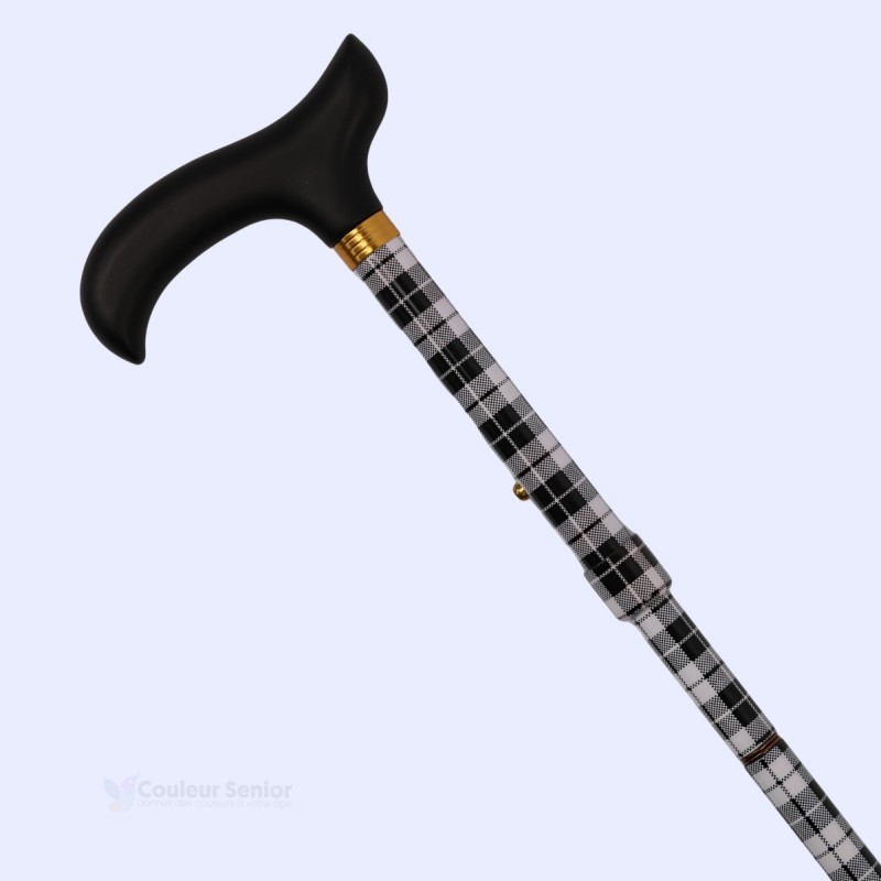 Belle poignée T noire sur canne de marche motif tartan écossais noir et blanc, très élégante et bien discrète.