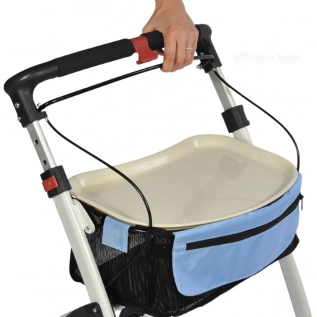 Vue du plateau de desserte beige et du sac bleu de l’ambulateur Neo Indoor, avec sa poignée ergonomique.  Qualité de pharmacie.