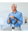 Senior homme assis bord du lit s'appuyant poignee mousse aide au lever Let's Get Up Trust