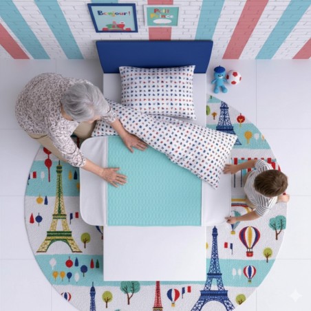 Alèse lavable pour pipi au lit installée sur lit simple enfant avec rabats