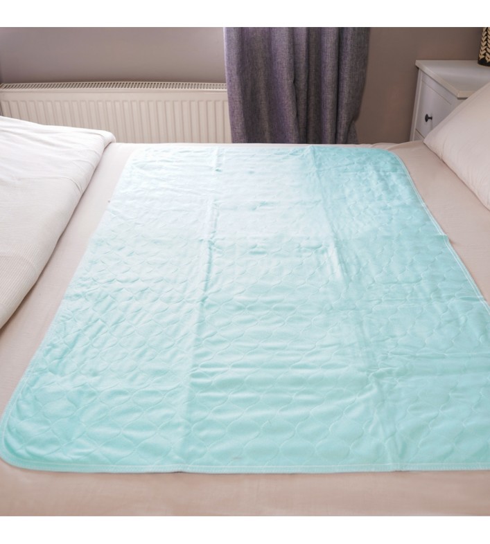 Alèse lavable sans rabat 85x135 cm turquoise sur lit double – vue de dessus