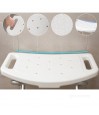 Assise ergonomique perforée du tabouret de douche. Écoulement de l'eau et confort des seniors.