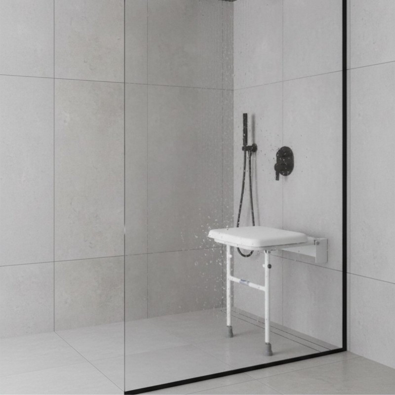 Fixation murale robuste pour siège de douche compact. Prévient les risques de glissade.