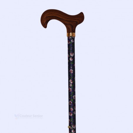 Vue à 45 degrés de canne pliante réglable en aluminium, fleurs et poignée en bois Derby.