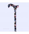 Poignée Derby d'une canne de marche noire fantaisie ornée de cercles orangés et blancs.