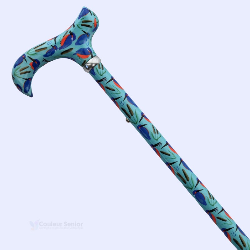 Vue diagonale de canne de marche pour femme, poignée Derby, motif original d’oiseaux bleu turquoise.