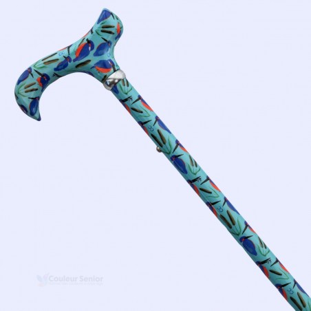 Vue diagonale de canne de marche pour femme, poignée Derby, motif original d’oiseaux bleu turquoise.