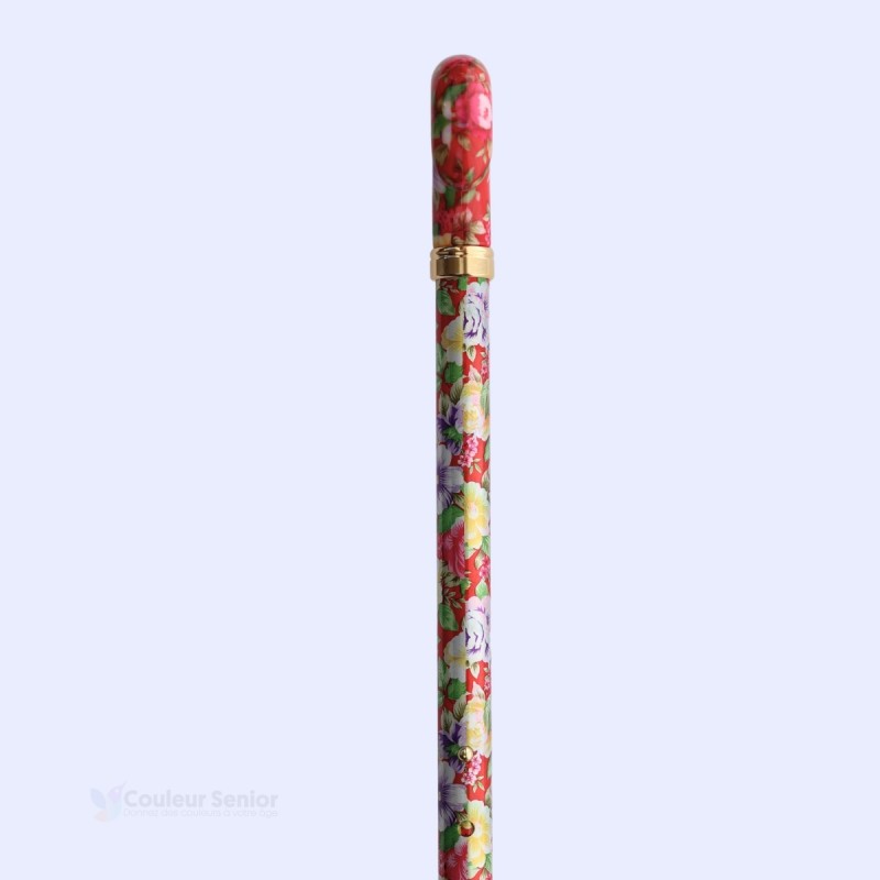 Détail du tube réglable de la canne de marche rouge fantaisie, cadeau original pour femme.