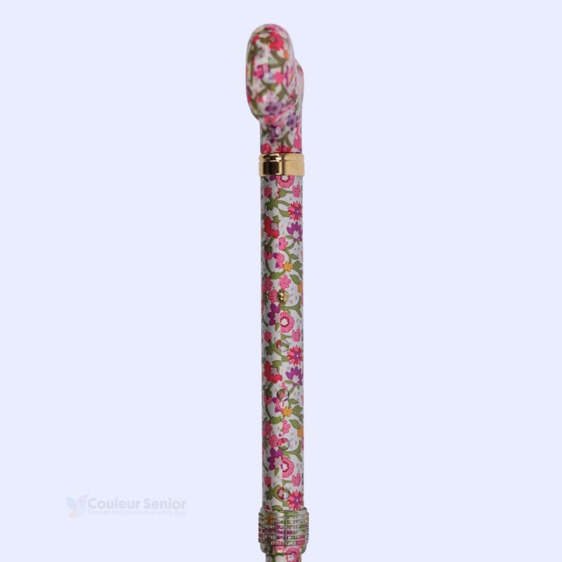 Poignée de la canne fleuri à 90°, révélant un système d’ajustement pratique de la hauteur.