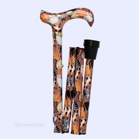 Canne de marche pliable et compacte, design chat souriant orange fantaisie, pratique et remboursable.