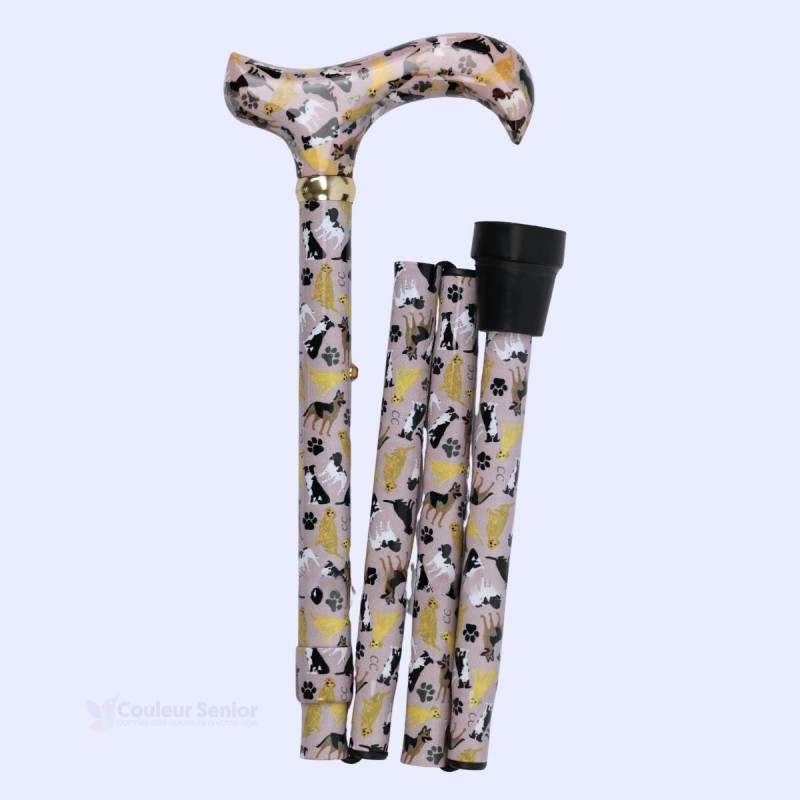 Côté droit de cette canne de marche pliable originale. Facile à ranger avec ses motifs chiens