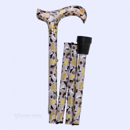 Côté droit de cette canne de marche pliable originale. Facile à ranger avec ses motifs chiens