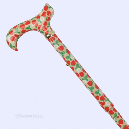 Détail du tube fleuri fantaisie et de la poignée de la canne pliable pour femme, originale et chic.