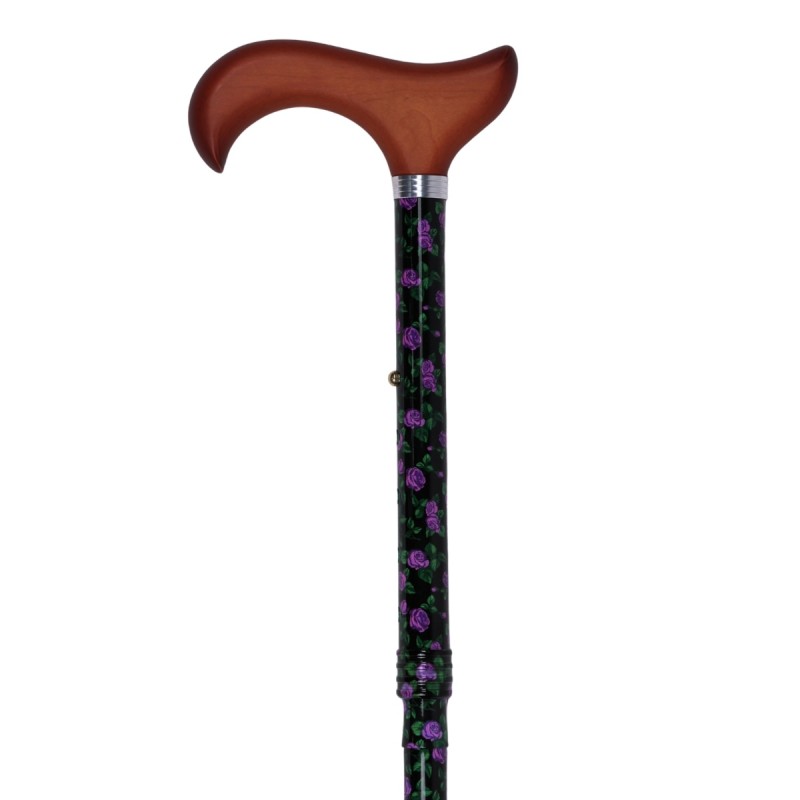 Belle canne pliante originale pour femme. Fleurs violettes sur fond noir et une sécurité au pas.