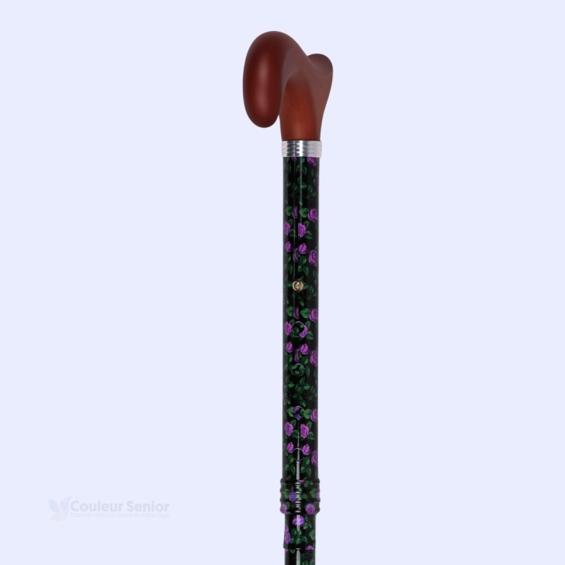 Canne pliante ornée de fleurs roses et mauves. Ce modèle, vraiment pratique, est idéal pour voyager avec style.