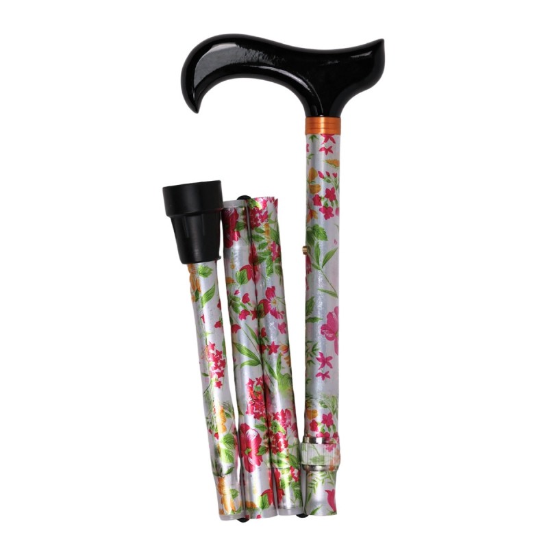 Belle canne pliante originale pour femme. Couleurs vibrantes, motif floral rose avec des feuilles vertes.