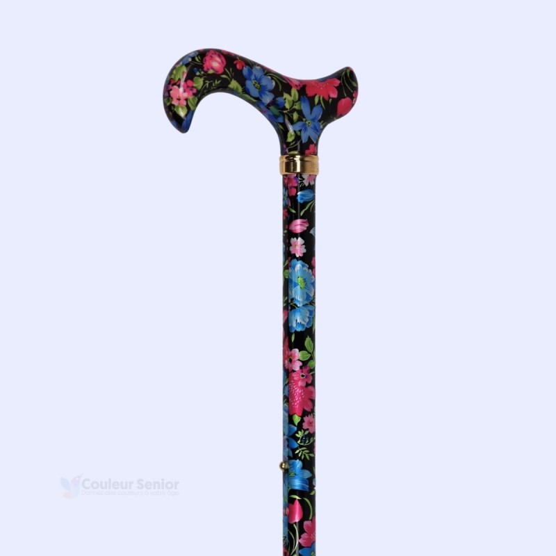 Vue rapprochée des motifs floraux colorés habillant élégamment le tube de la canne de marche CouleurSenior