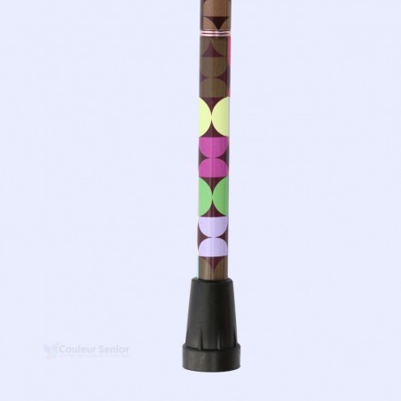 Détail de l’embout de sécurité d’une canne de marche réglable pour femme, style multicolore original.