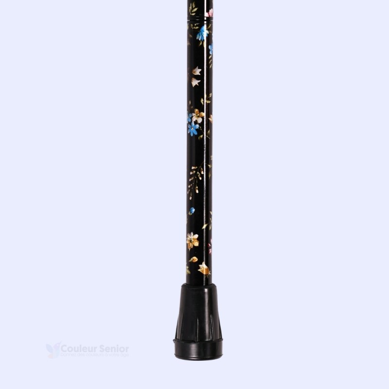 Embout antidérapant de canne de marche noire à fleurs spéciales.