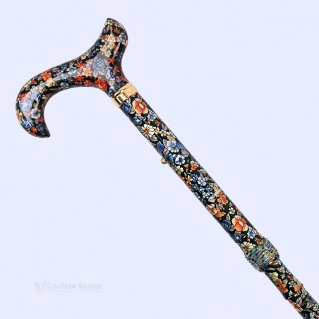 Détail de poignée en diagonale, canne de marche pour femme à fleurs bleues et orange.