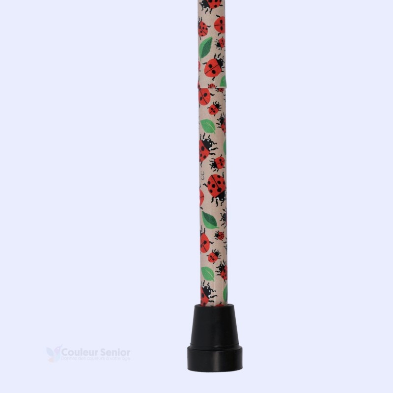 Embout sécurisé de cette canne de marche femme fantaisie, idéale pour la pleine nature.