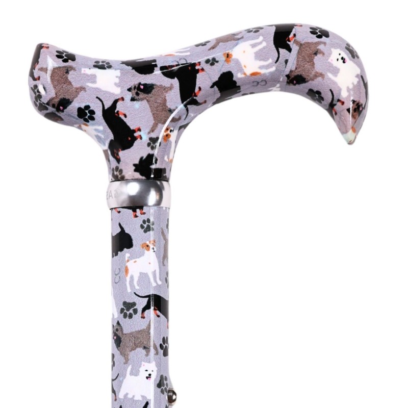 Système de réglage en hauteur de 82 à 92 cm, par crans de 2,5 cm, sur la canne motif chiens.