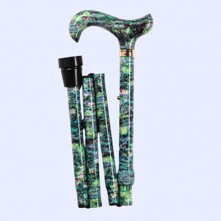 Canne pliante pour femme, pliée à gauche, design floral Monet assurant la sécurité à domicile.
