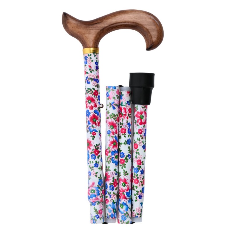 Canne de marche Liberty Printemps, pliable, motif floral sur fond blanc, poignée en bois clair.