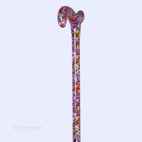 Système de réglage de 77 à 100 cm sur cette élégante canne en aluminium rouge à motif floral. Canne Volubilis.