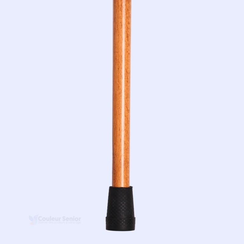 Embout antidérapant de la  canne de marche en bois jaune, clé de prévention des chutes.