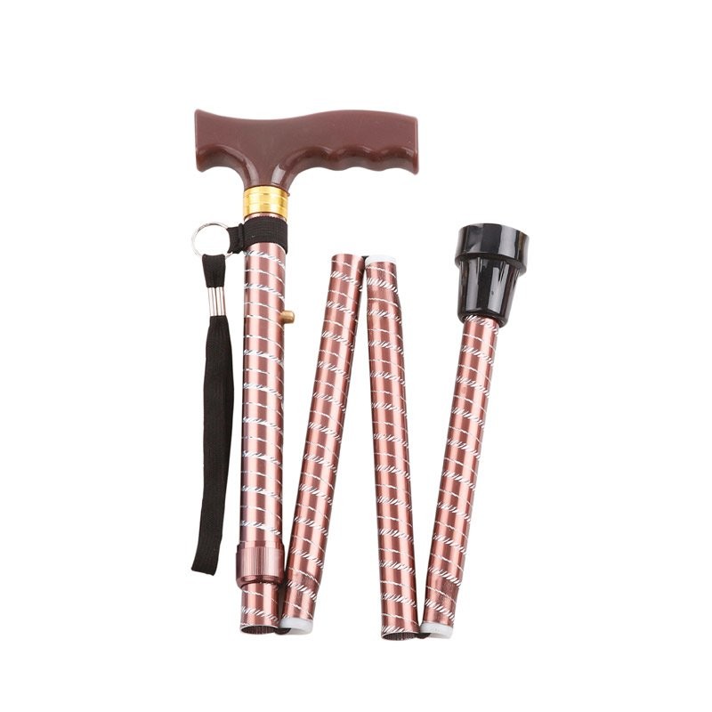 Canne de marche pliante Victoire Or Rose pliable et réglable, pratique pour se déplacer et ranger.