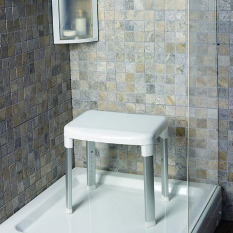 Siège de douche sans dossier, design blanc élégant, sécurité anti-chute pour adulte.